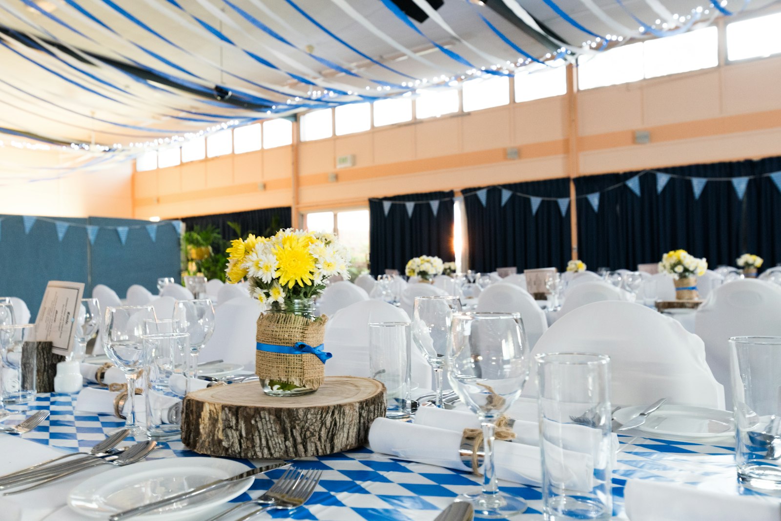 Wedding guests celebrating and taking photos at a reception